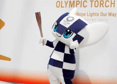 پدر یک قربانی سونامی ژاپن مشعل المپیک را حمل می کند